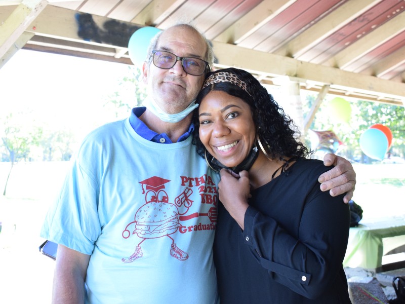 staff member and participant at our annual cookout