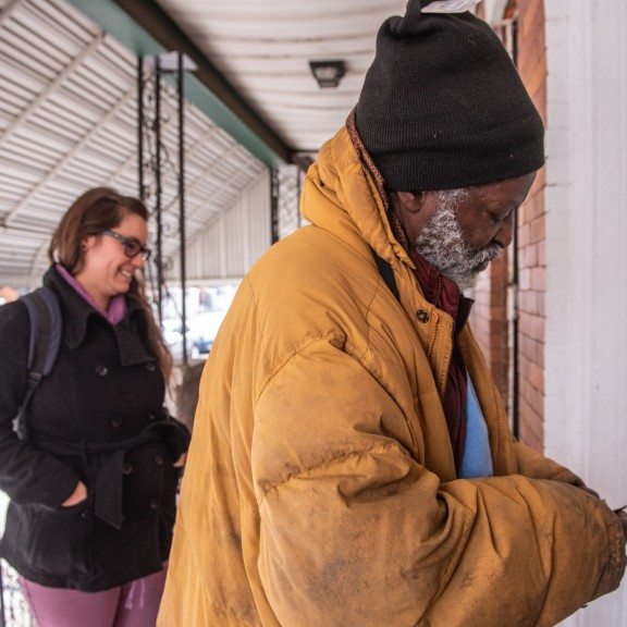 Pathways participant opening door to his home