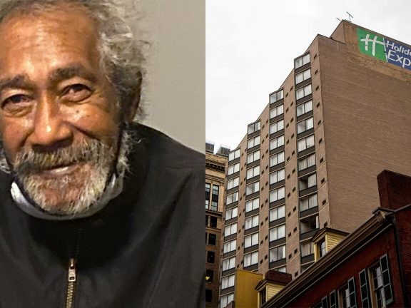 smiling man next to an image of the Holiday Inn Express in Center City