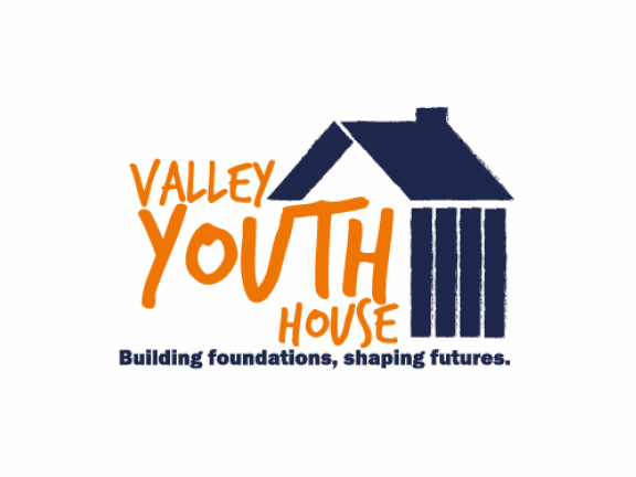 valley youth house logo with building foundations, shaping futures tagline under