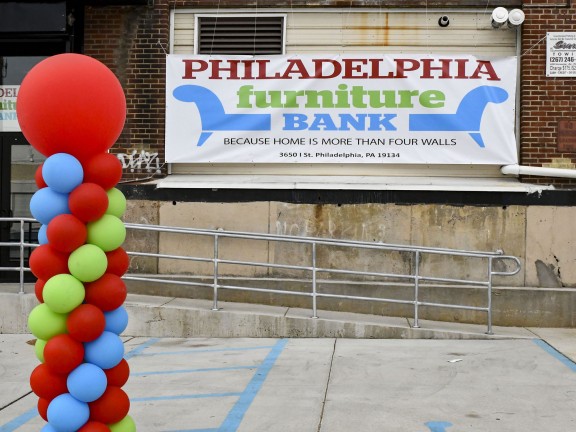Balloons outside the grand reopening of the Philadelphia Furniture Bank