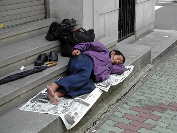 A person sleeping on the street