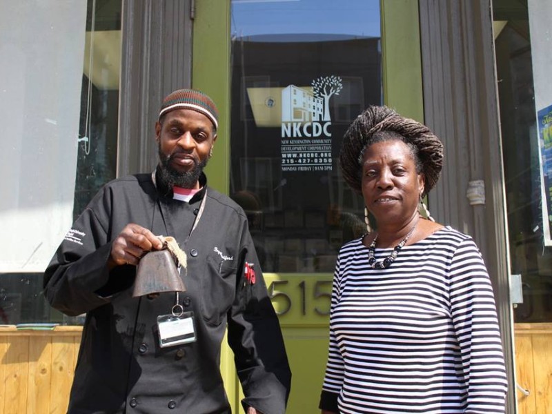 two people standing in front of NKCDC