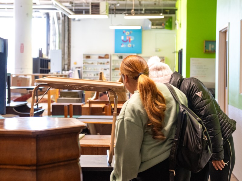 case manager and client choosing furniture at the Philadelphia Furniture Bank