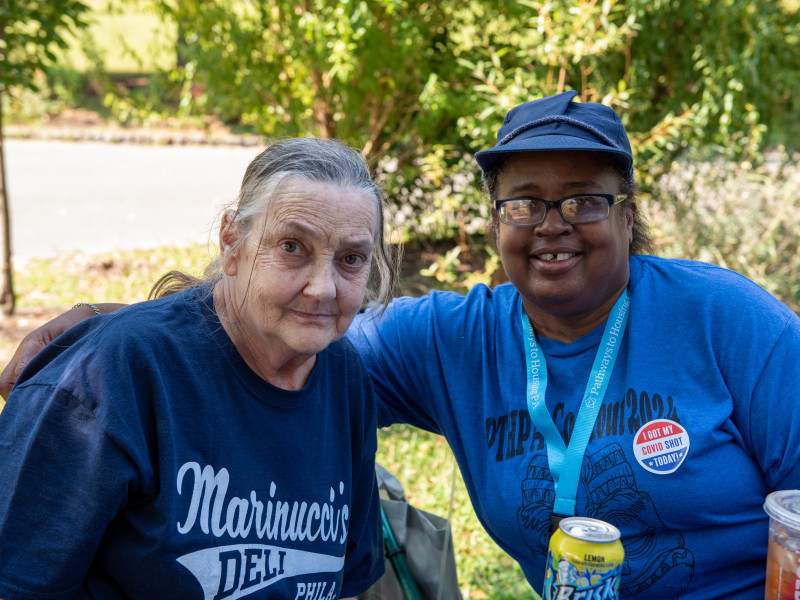 Debbie on the left taking a photo with Angie, a Pathways staff member
