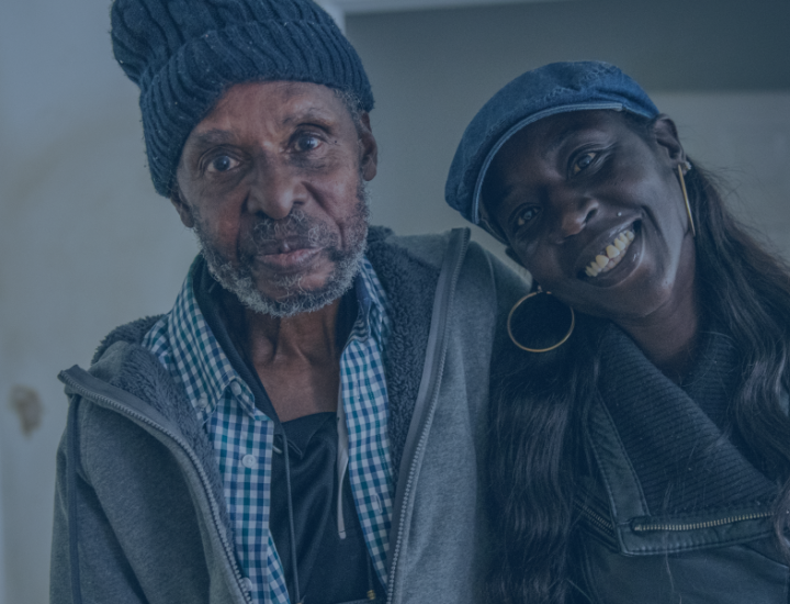 man and woman smiling