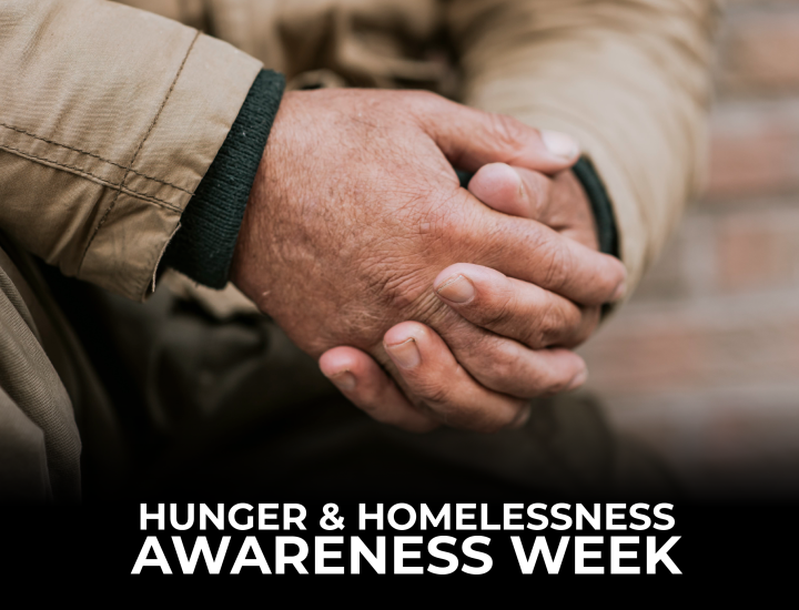 hunger and homelessness awareness week text in front of two hands clasped together