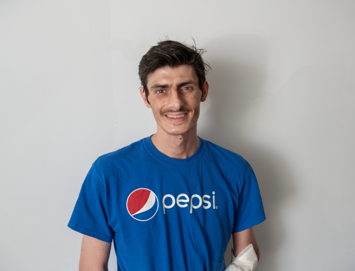 participant james smiling at camera