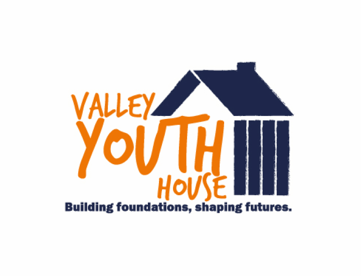 valley youth house logo with building foundations, shaping futures tagline under